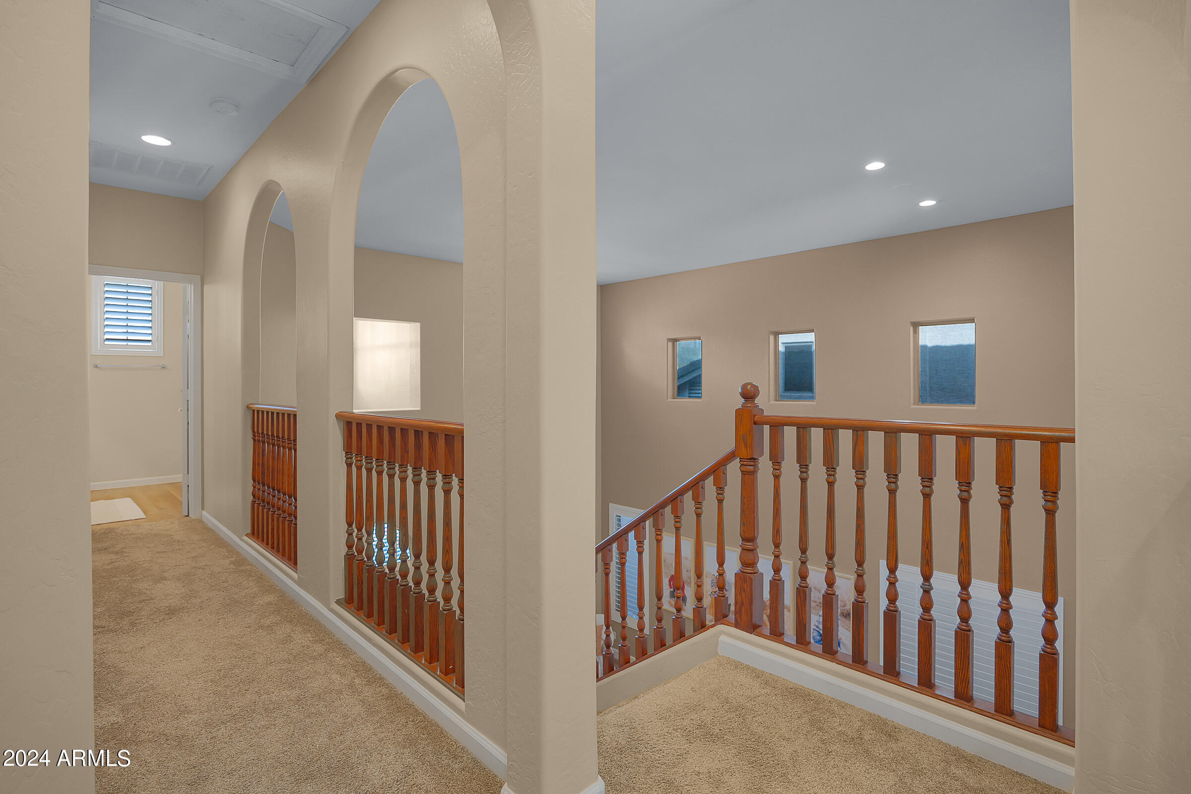2909 West Silver Fox Way Phoenix, AZ 85045 - Photo 21 of 34 a view of staircase with rug floor
