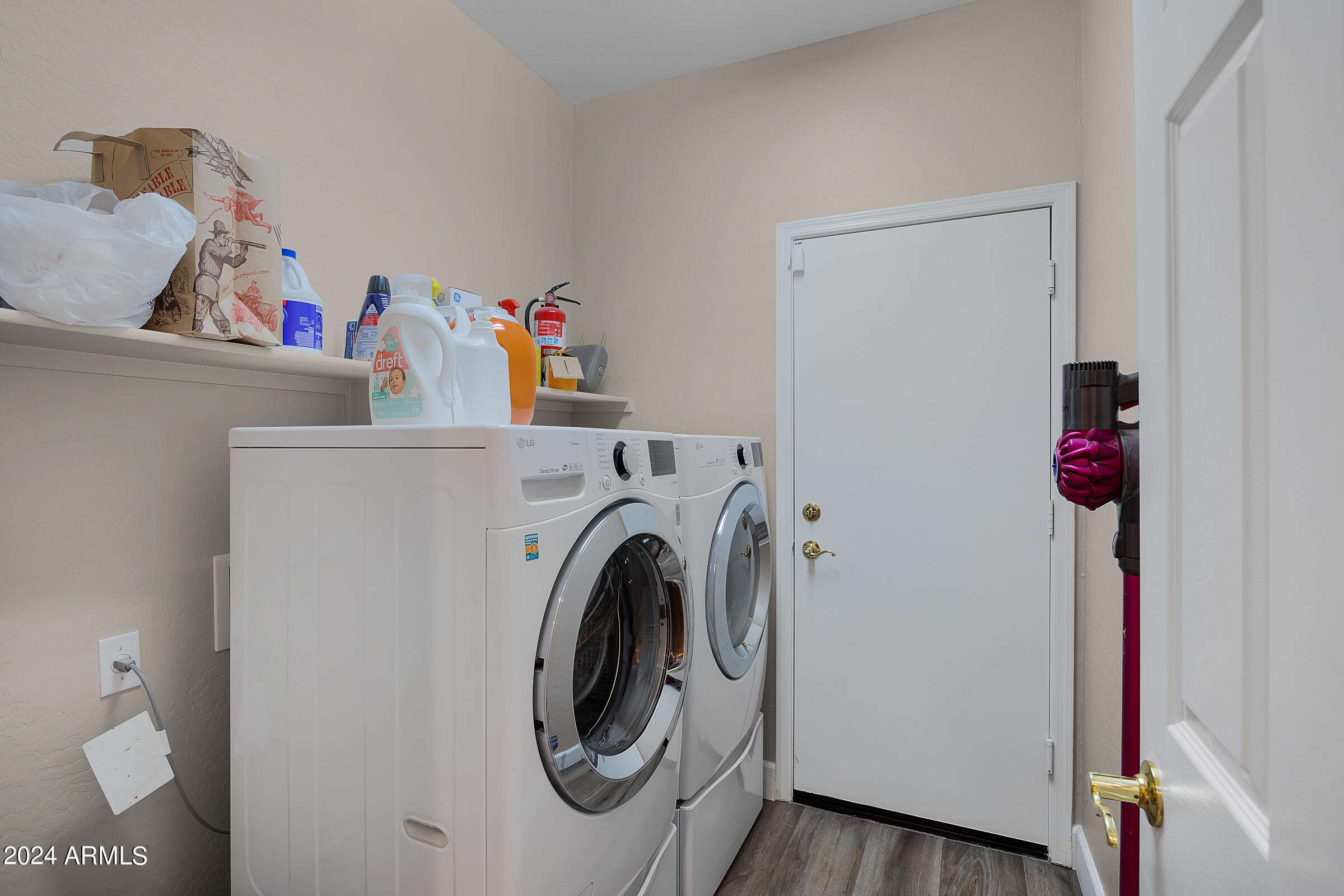 2909 West Silver Fox Way Phoenix, AZ 85045 - Photo 28 of 34 a utility room with dryer and washer