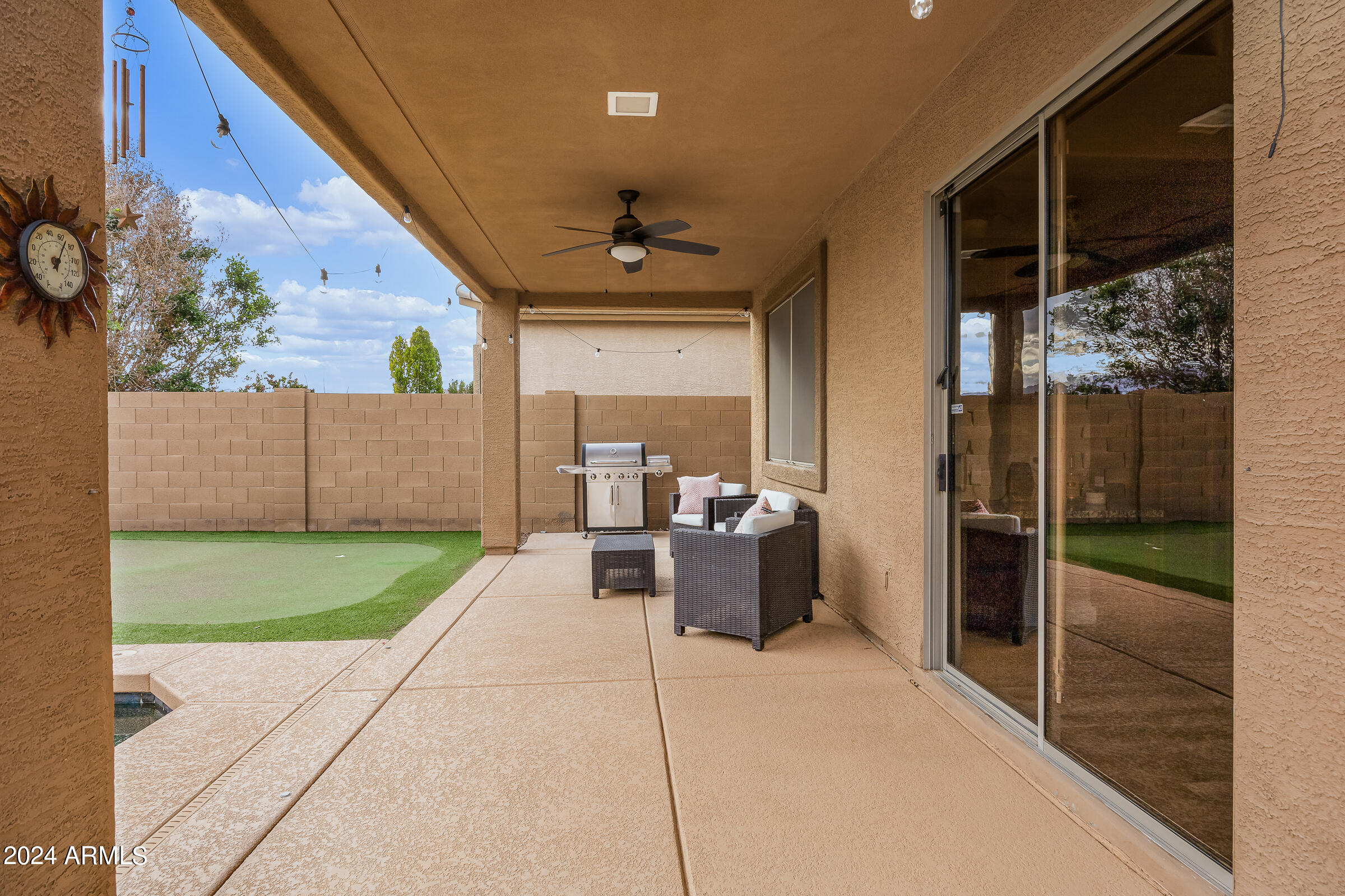 2909 West Silver Fox Way Phoenix, AZ 85045 - Photo 30 of 34 a view of a porch with seating space