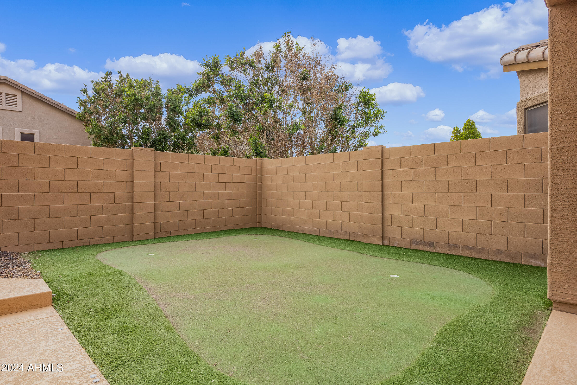 2909 West Silver Fox Way Phoenix, AZ 85045 - Photo 32 of 34 a view of a backyard