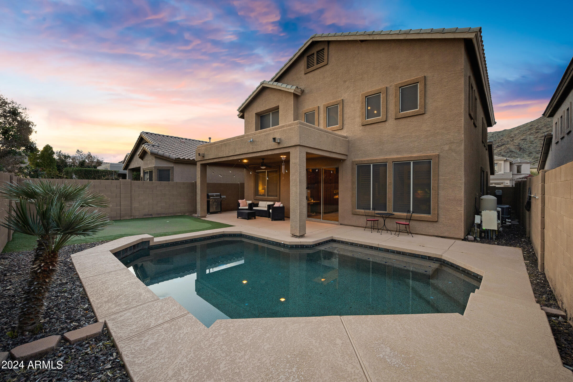 2909 West Silver Fox Way Phoenix, AZ 85045 - Photo 34 of 34 a view of a house with pool table and chairs