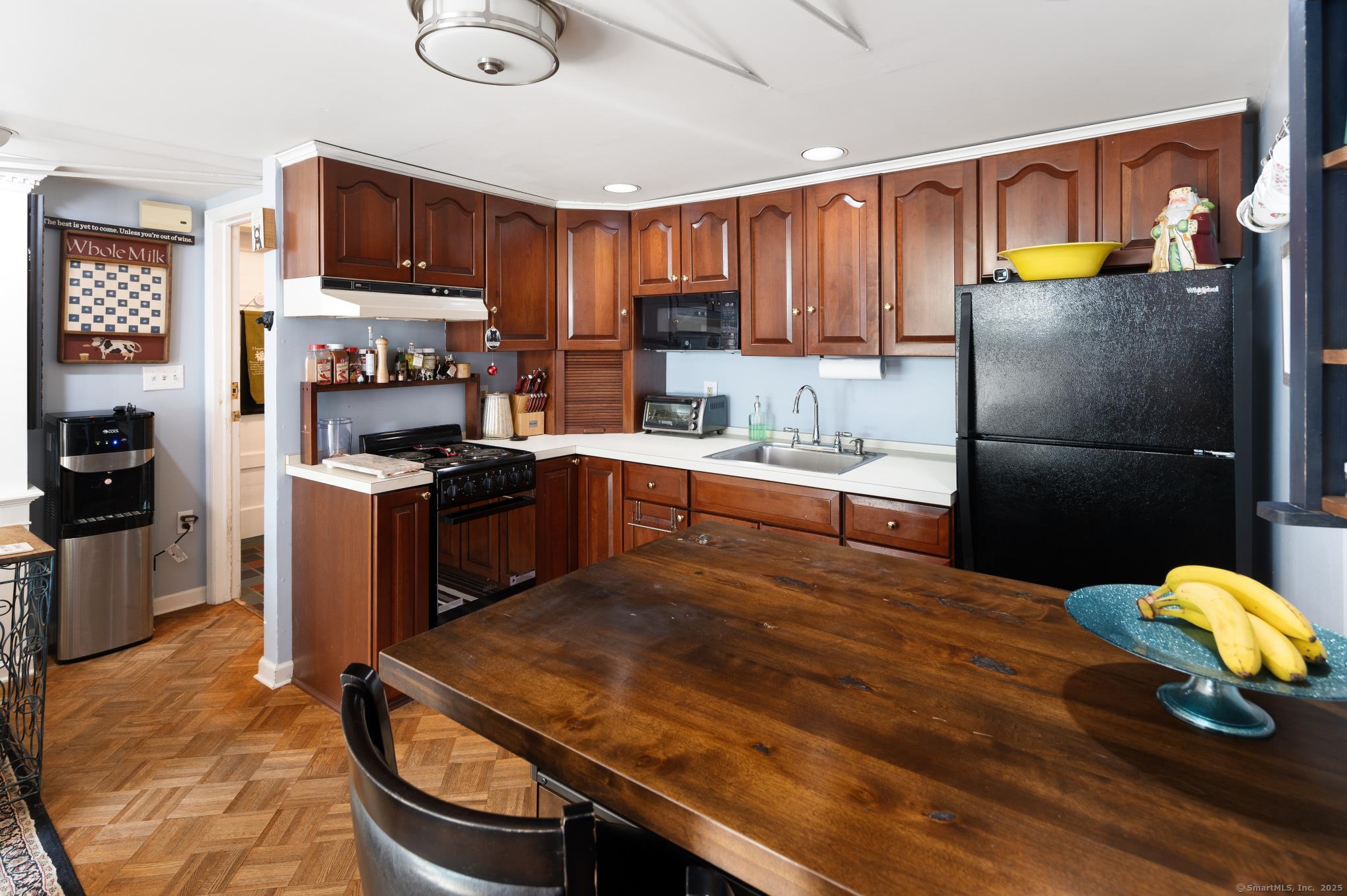 696 Kent Road New Milford, CT 06755 - Photo 11 of 28 a kitchen with stainless steel appliances granite countertop a sink refrigerator stove microwave and cabinets