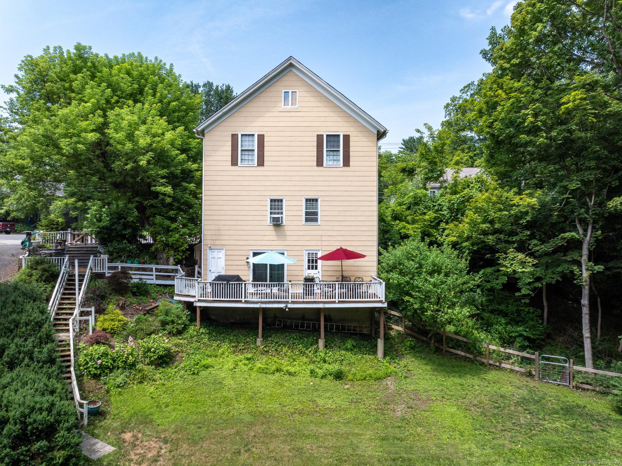 696 Kent Road New Milford, CT 06755 - Photo 16 of 28 a view of house with backyard and sitting area