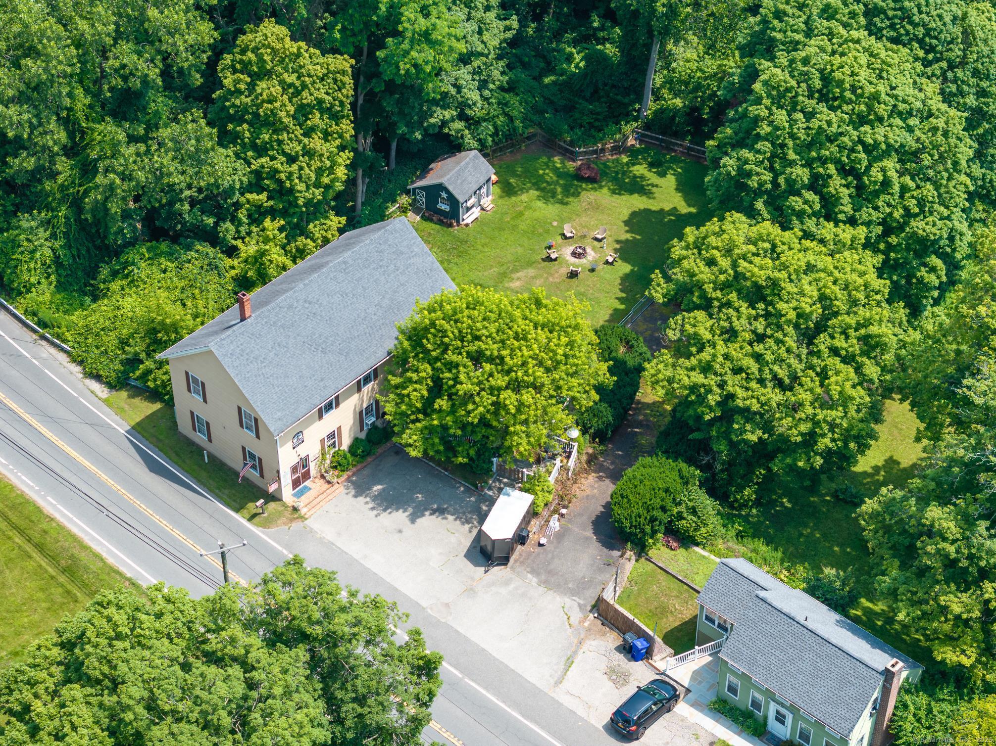 696 Kent Road New Milford, CT 06755 - Photo 18 of 28 an aerial view of a house with a yard