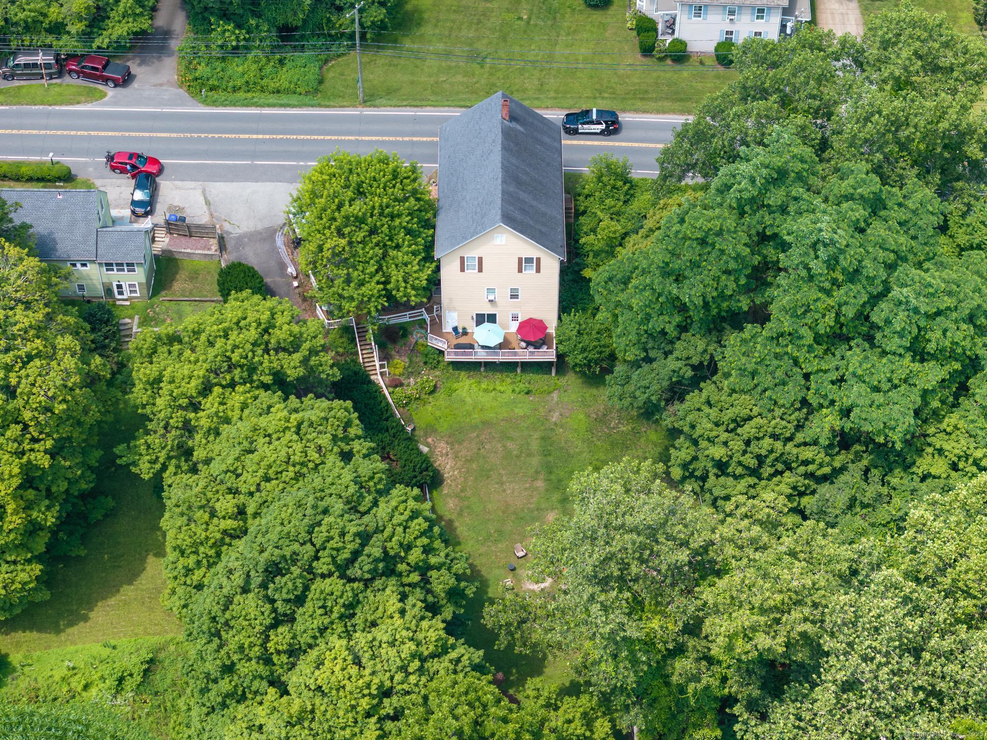 696 Kent Road New Milford, CT 06755 - Photo 24 of 28 an aerial view of a house with a yard and garden view
