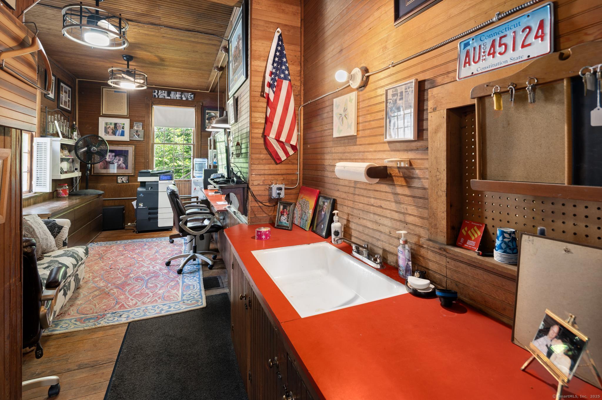 696 Kent Road New Milford, CT 06755 - Photo 4 of 28 a view of a patio with swimming pool table and chairs