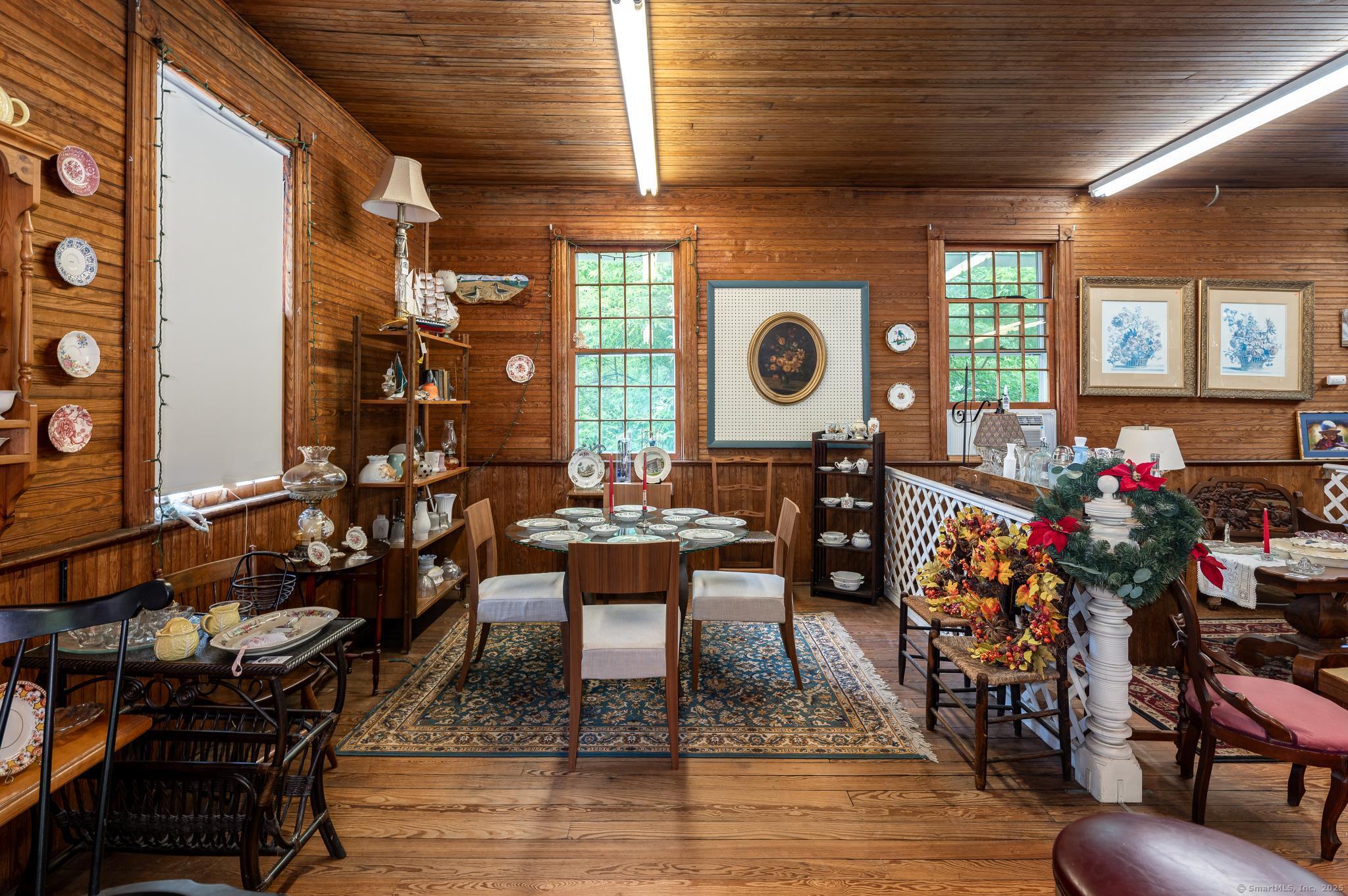 696 Kent Road New Milford, CT 06755 - Photo 7 of 28 a living room filled with furniture