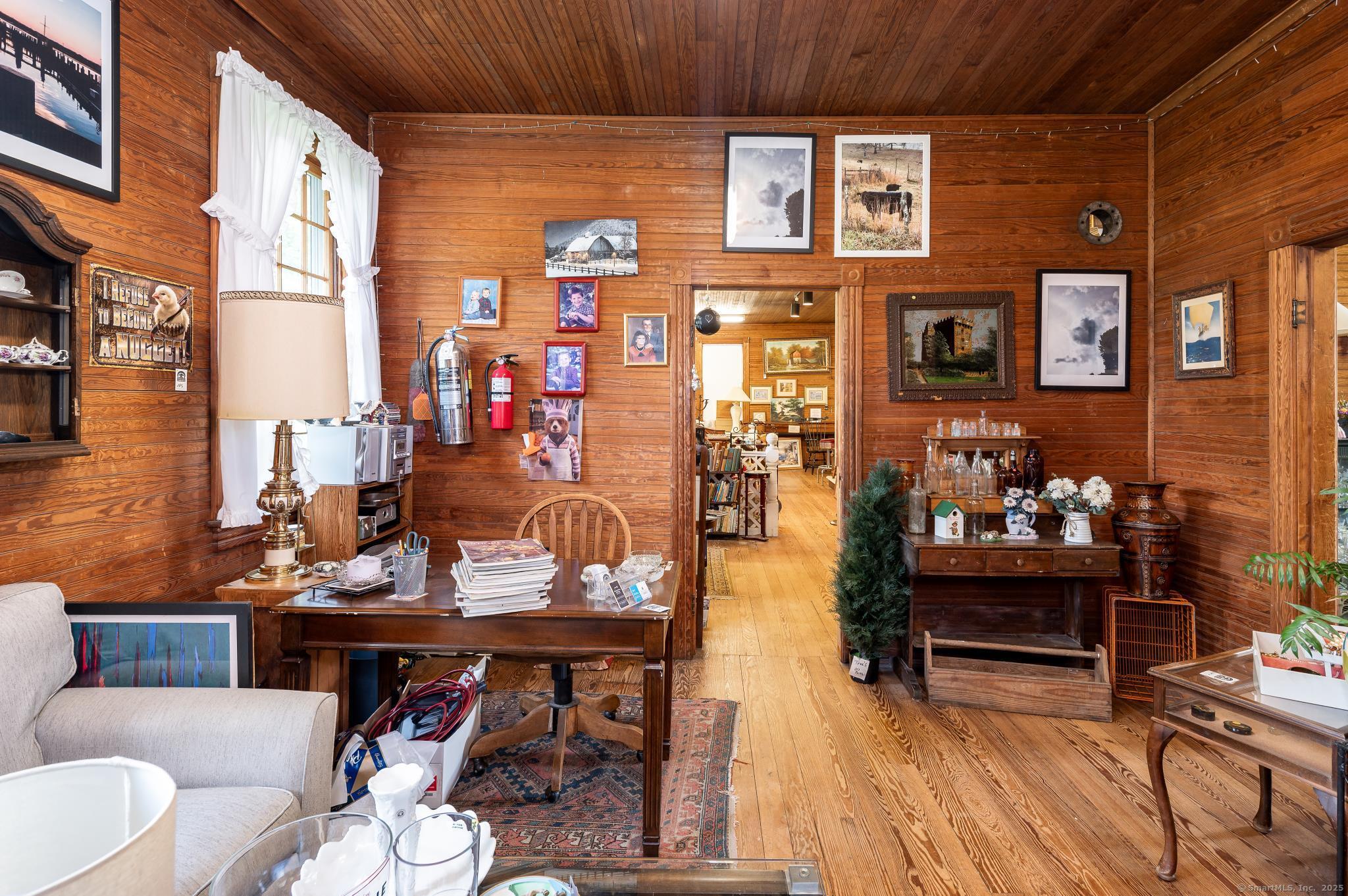 696 Kent Road New Milford, CT 06755 - Photo 9 of 28 a view of a dinning tables and chairs in a patio