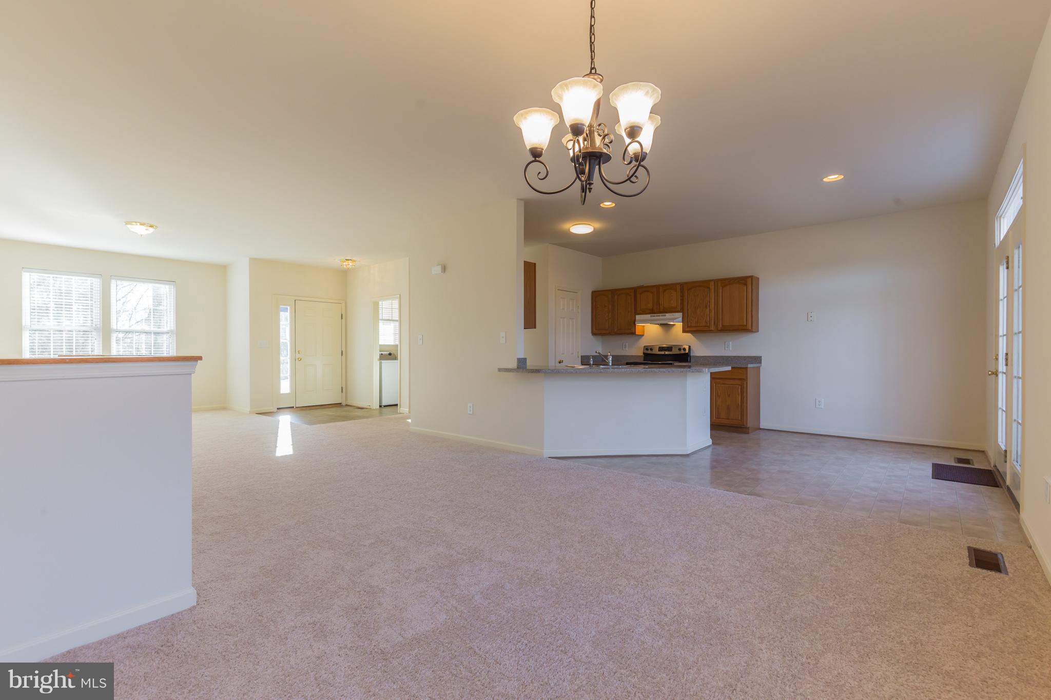 11155 Rawhide Road Lusby, MD 20657 - Photo 11 of 30 Dining area is open to the living and kitchen
