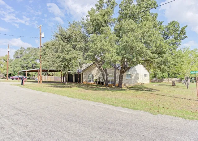 a view of a trees in front of a building