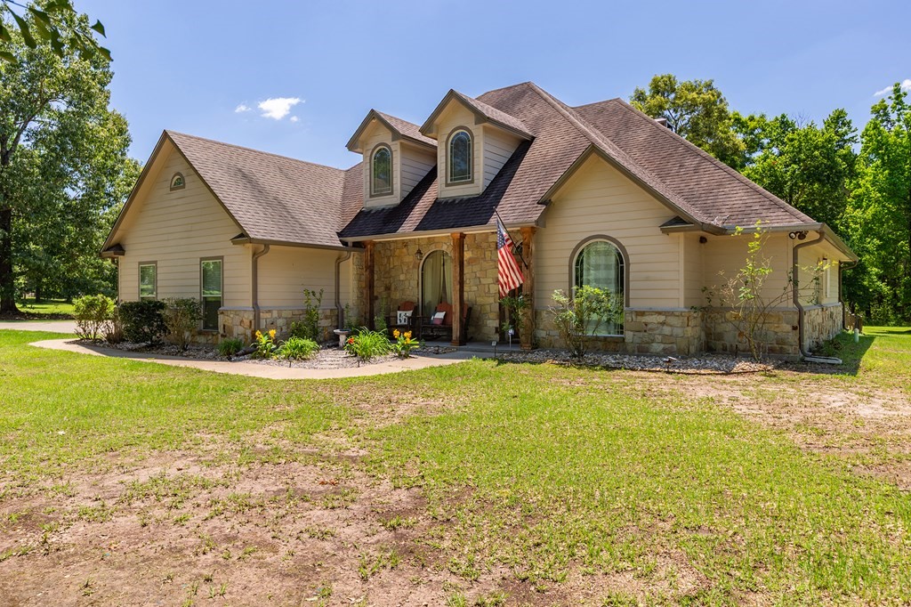 1171 Old Ewing Road Lufkin, TX 75901 - Photo 42 of 49 a front view of house with yard and green space