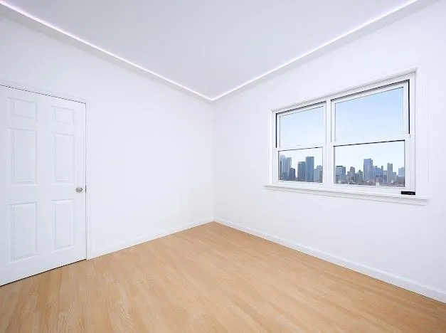 a bedroom with a window