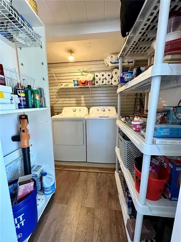a kitchen with stainless steel appliances granite countertop a stove and cabinets