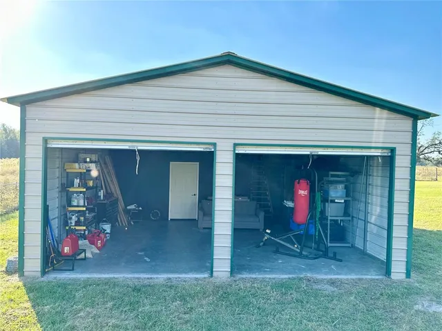a view of a livingroom with furniture and front door