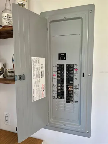 a view of front door with wooden floor