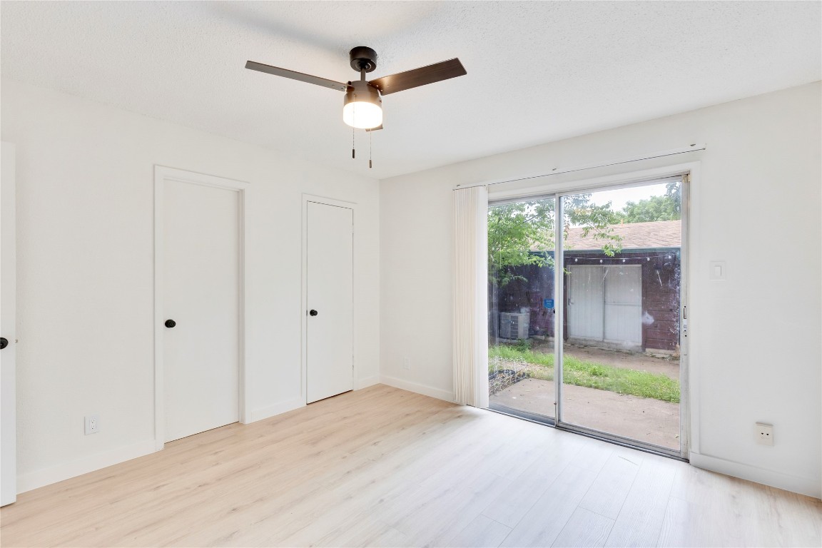 2314 Greenfield Parkway, Unit 108 Austin, TX 78741 - Photo 5 of 23 a view of an empty room with a balcony