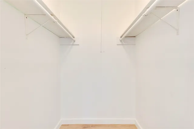 a view of small space with racks on the wall