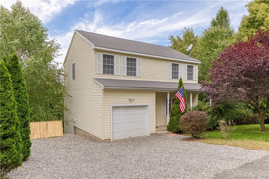 119 Prospect Street Ansonia, CT 06401 - Photo 1 of 1 a front view of house with yard and trees