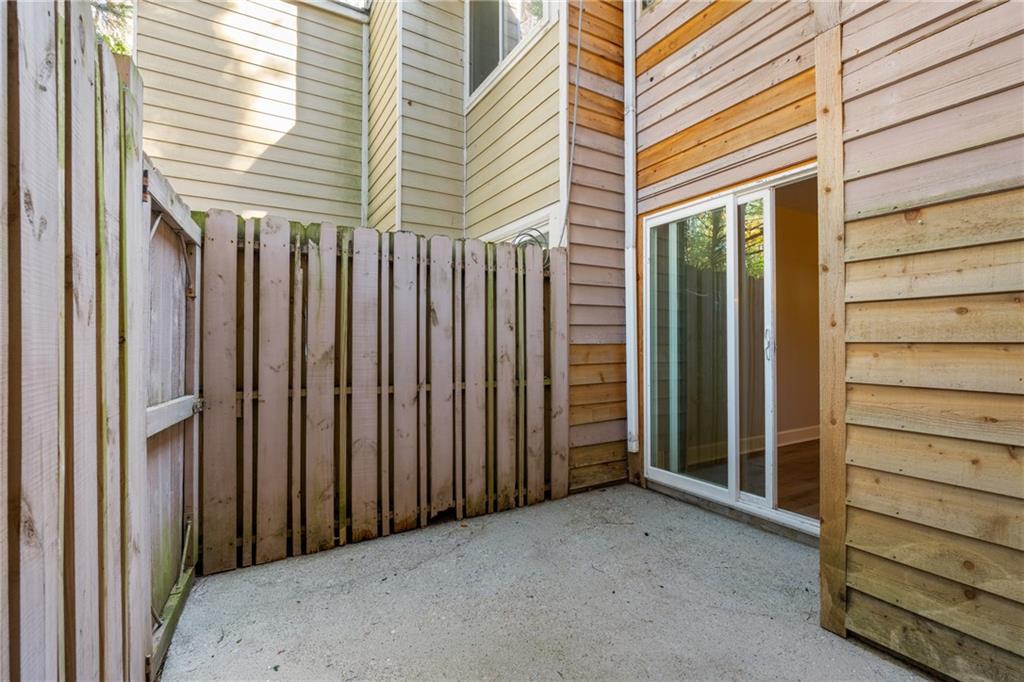 469 Granite Ridge Place Atlanta, GA 30350 - Photo 17 of 18 a view of a backyard with a house