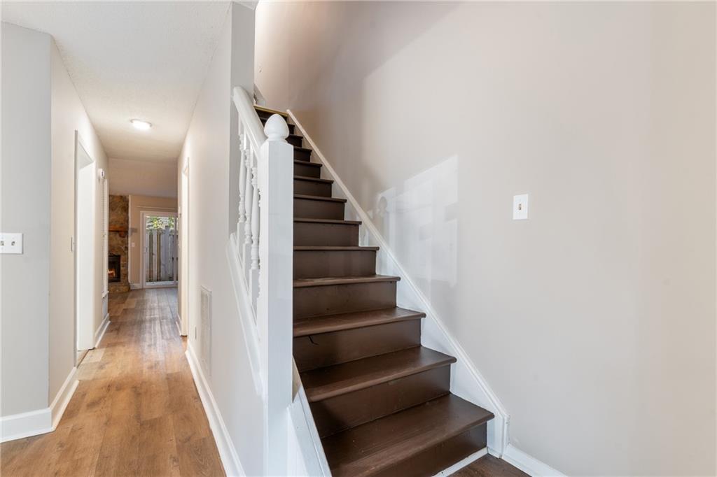 469 Granite Ridge Place Atlanta, GA 30350 - Photo 10 of 18 a view of entryway and gallery with wooden floor