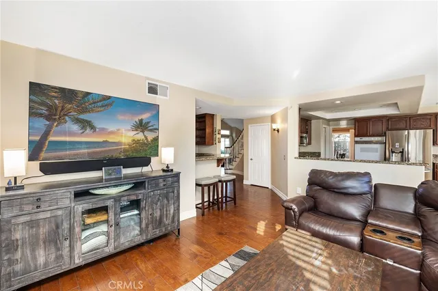 a kitchen with a stove top oven sink and cabinets