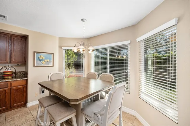 a view of wooden floor in livingroom with furniture and wooden floor