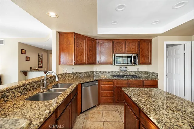a bedroom with a large bed and a large window