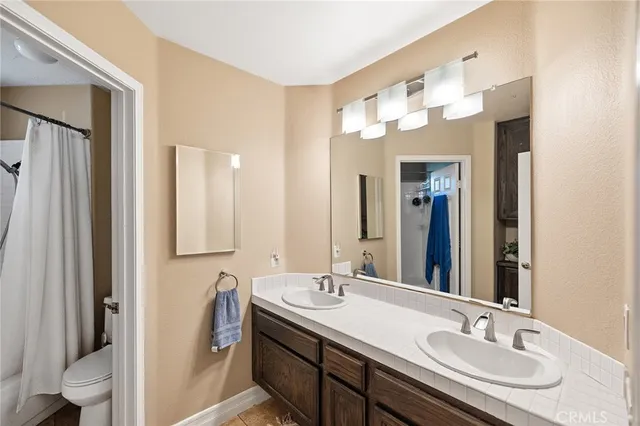 an aerial view of residential house with outdoor space and river