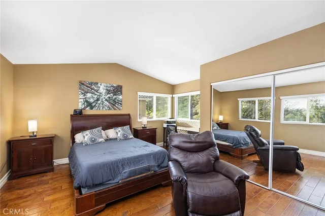 a view of a swimming pool with an outdoor seating and a yard