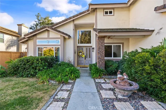 a front view of a house with a porch