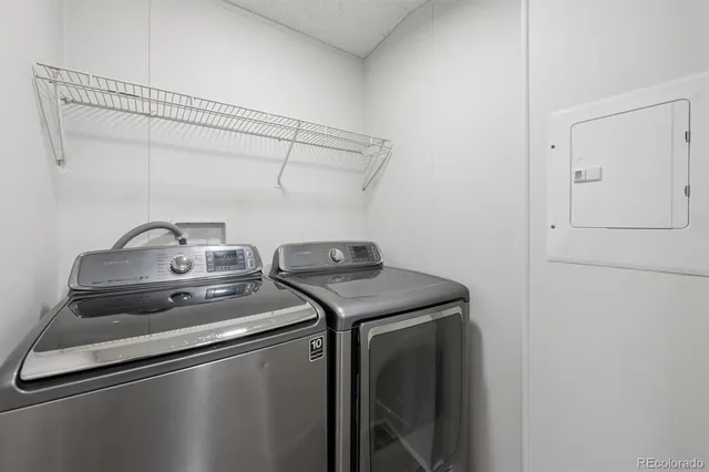a utility room with dryer and washer
