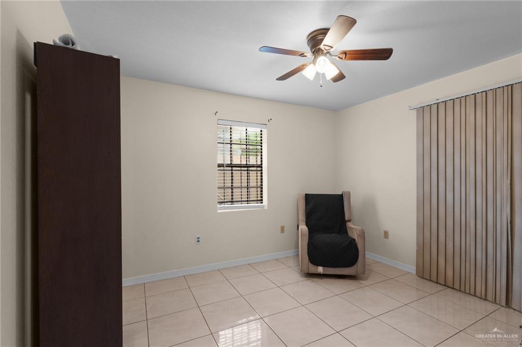157 San Agustin Street Rio Grande City, TX 78582 - Photo 12 of 17 a living room with furniture and a window