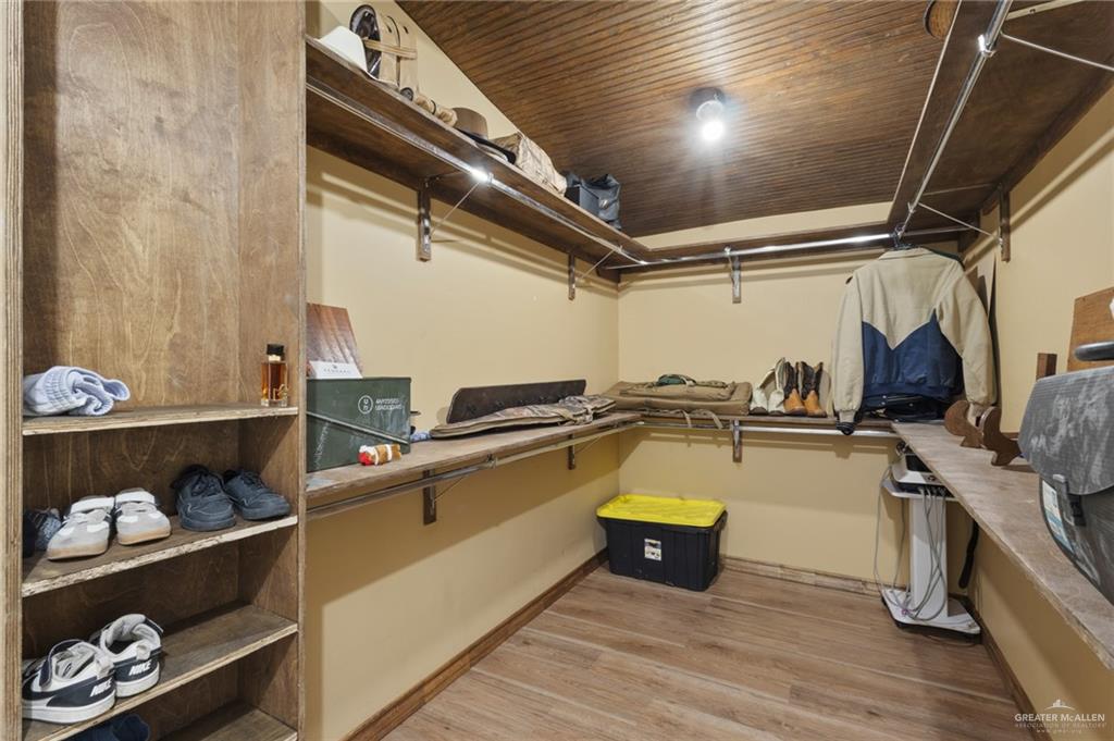 157 San Agustin Street Rio Grande City, TX 78582 - Photo 13 of 17 a room with storage and utility