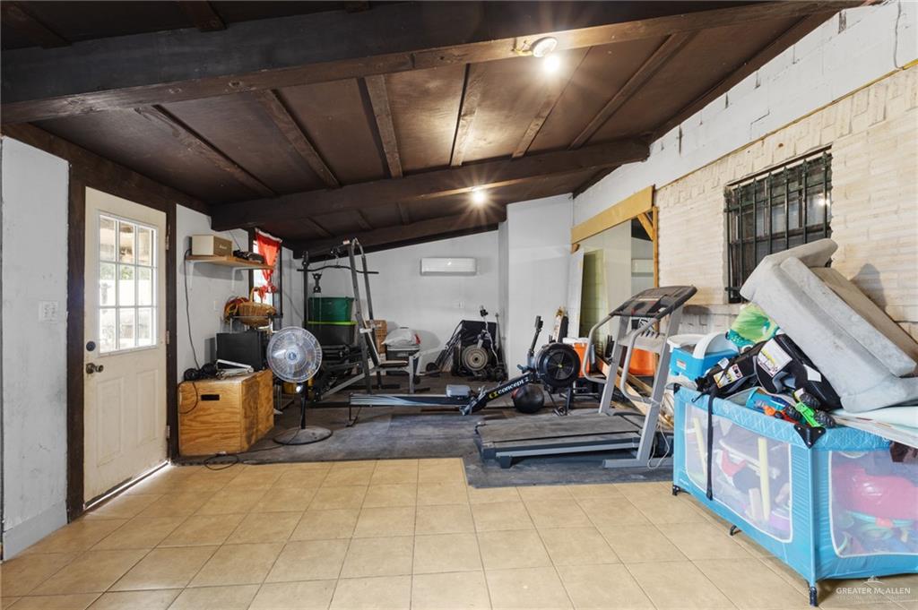 157 San Agustin Street Rio Grande City, TX 78582 - Photo 15 of 17 a view of a room with gym equipment