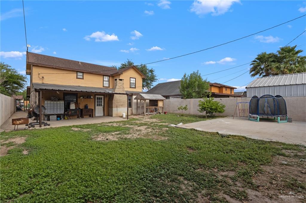 157 San Agustin Street Rio Grande City, TX 78582 - Photo 16 of 17 a front view of a house with a yard
