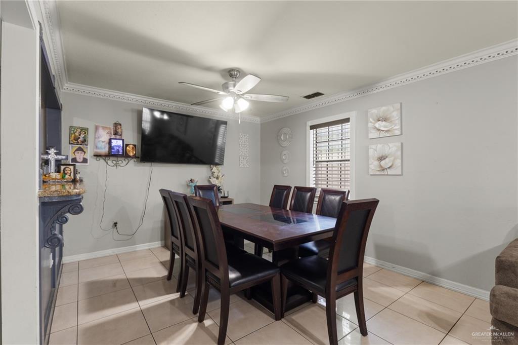 157 San Agustin Street Rio Grande City, TX 78582 - Photo 4 of 17 a view of a dining room with furniture