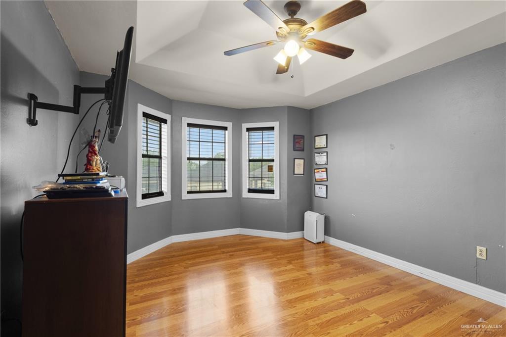 157 San Agustin Street Rio Grande City, TX 78582 - Photo 10 of 17 a view of an empty room with a window and a chandelier