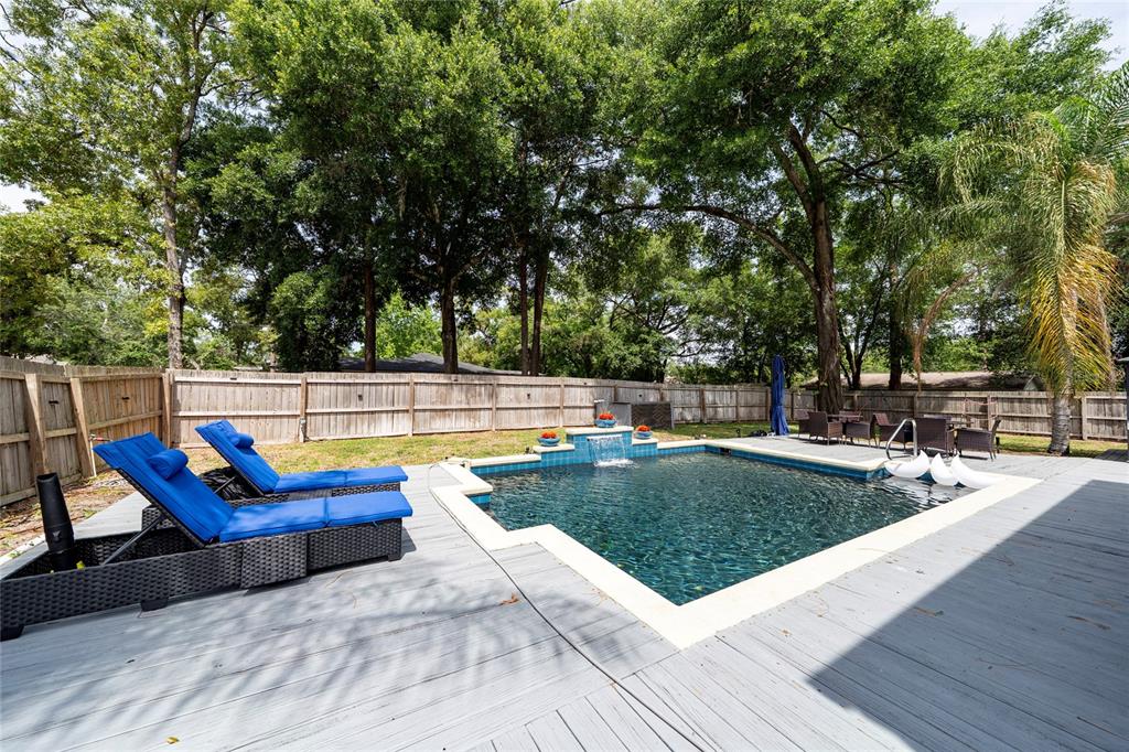 357 Ridgewood Street Altamonte Springs, FL 32701 - Photo 27 of 36 a view of a swimming pool with a patio