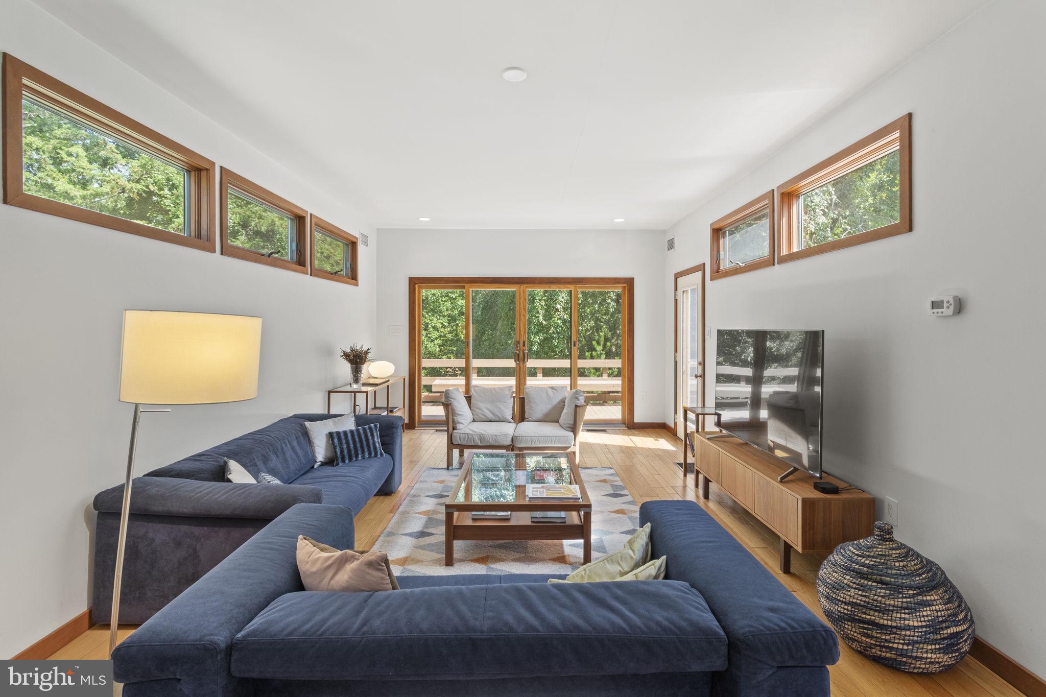 435 Crescent Road Wyncote, PA 19095 - Photo 23 of 63 Family room with slider to deck