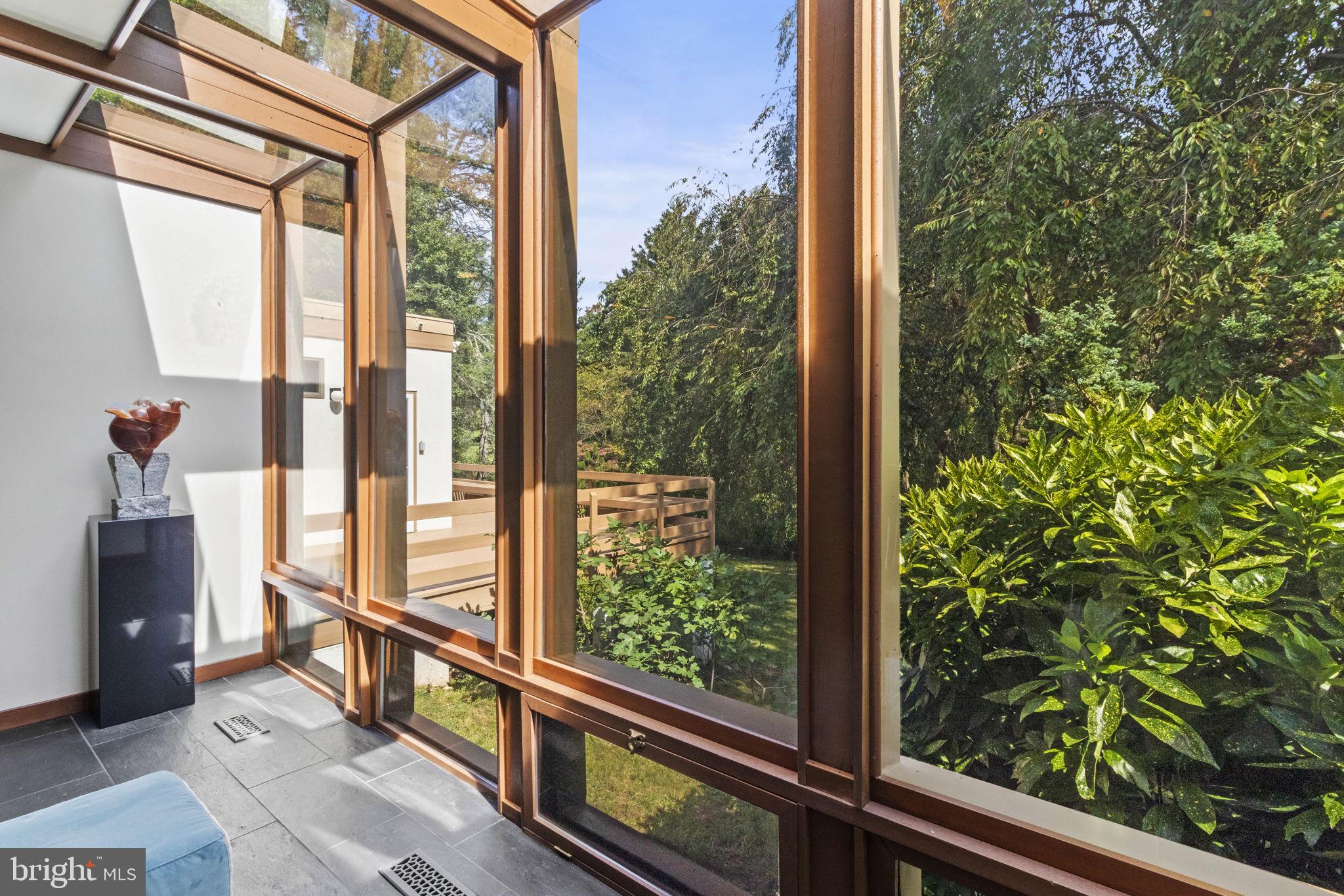 435 Crescent Road Wyncote, PA 19095 - Photo 9 of 63 Windows overlooking backyard and pond