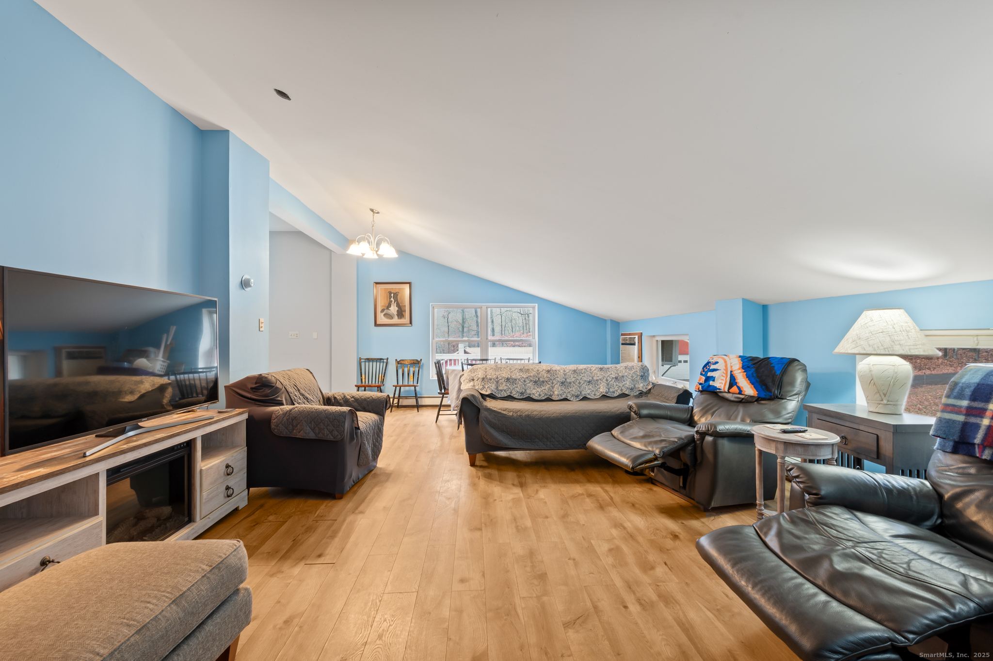 57-59 And Parcel C Pope Road Oxford, CT 06478 - Photo 22 of 36 a living room with furniture and a flat screen tv