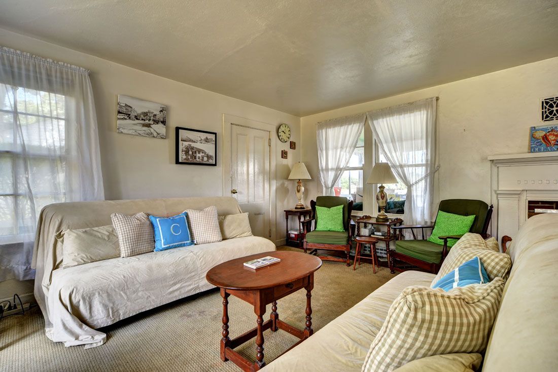 9 Bluff Point Lane Sag Harbor, NY 11963 - Photo 12 of 25 a living room with furniture and a large window