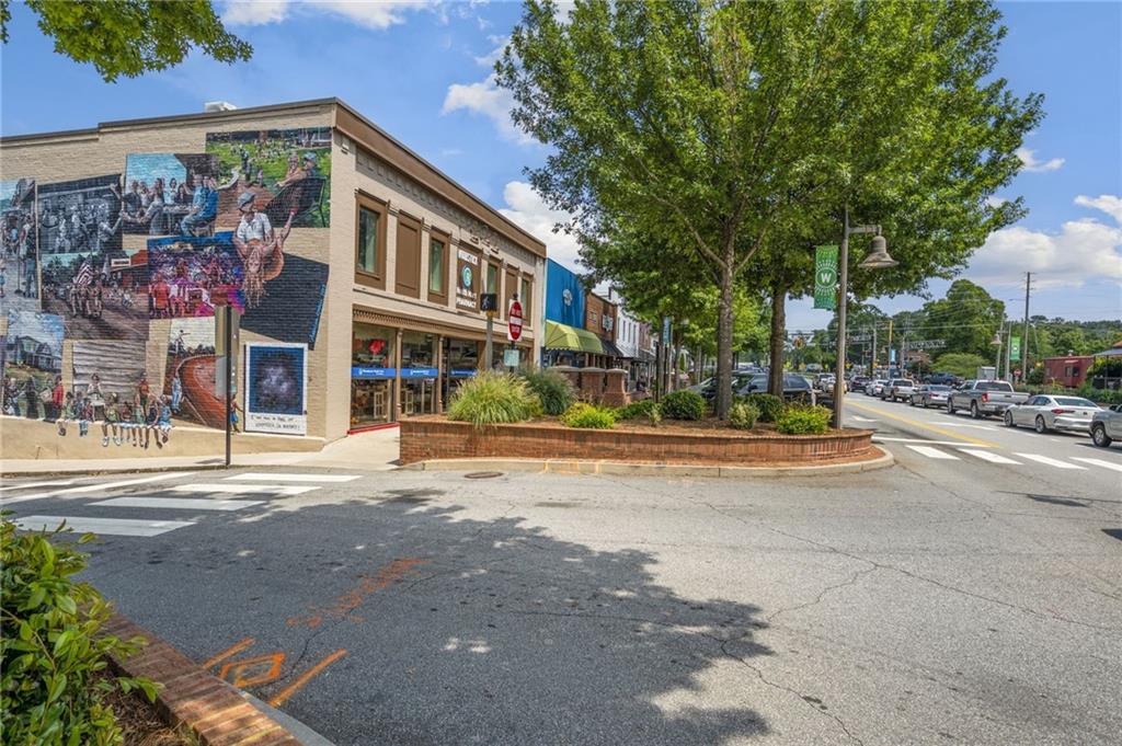 266 Balaban Circle Woodstock, GA 30188 - Photo 37 of 58 a view of a building with a street