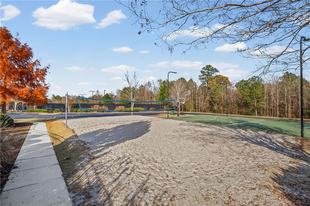 266 Balaban Circle Woodstock, GA 30188 - Photo 54 of 58 a view of a swimming pool with a yard