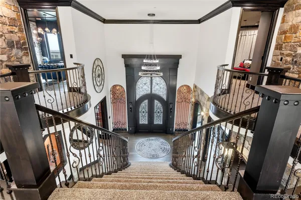 a view of an entryway with a front door