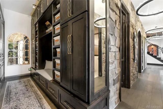 a hallway with hardwood floor