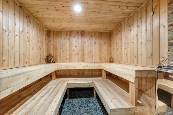 a kitchen with a sink and large window