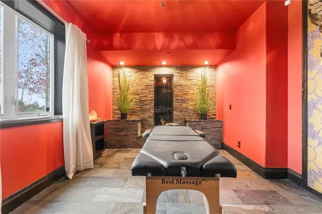 a dining room with furniture and a window