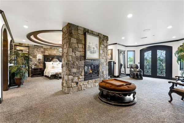 a room with furniture and a large window