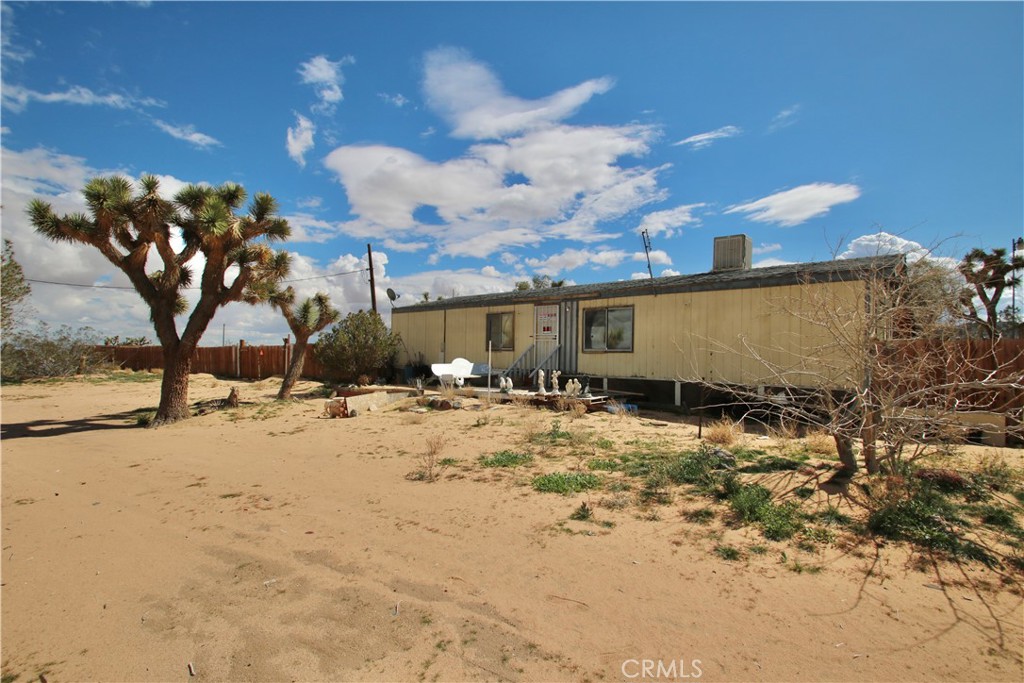 59631 Bearing Tree Road Landers, CA 92285 - Photo 1 of 1 a view of back yard of the house